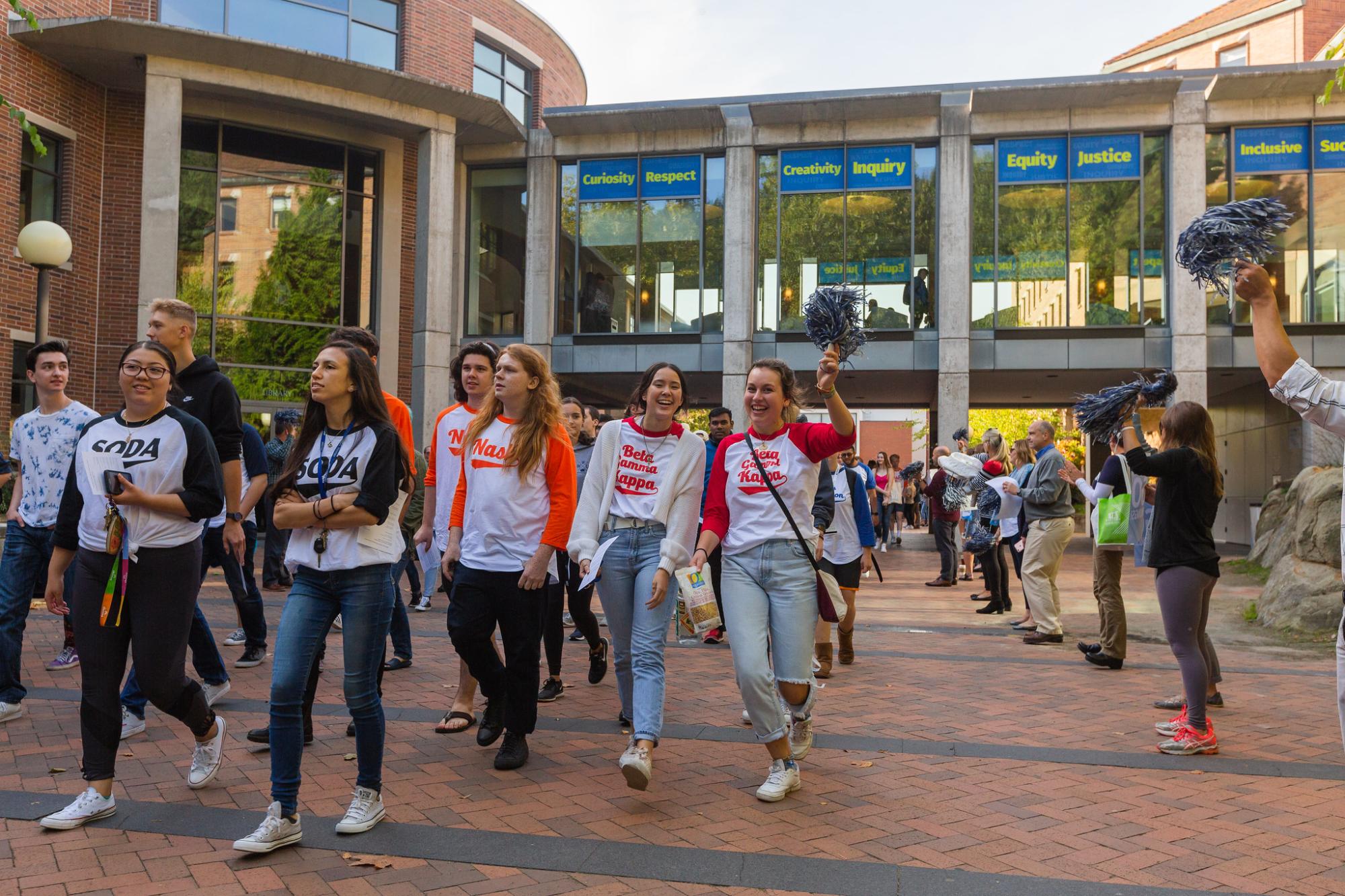 Students being welcomed to campus
