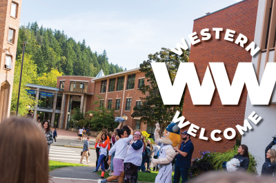 Western Welcome logo on an image of students high-fiving Victor Viking on the PAC Plaza