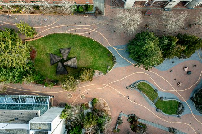 a bird's-eye view of the brick pathways and grassy hillsides between the art and chemistry buildings